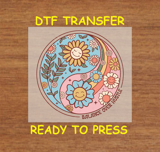 "Balance Over Hustle DTF transfer with flowers in a yin-yang design, ready to press."