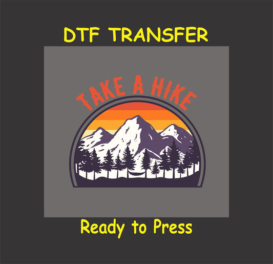 "Take a Hike DTF transfer with mountain, sunset, and tree design, ready to press for hiking-themed shirts."