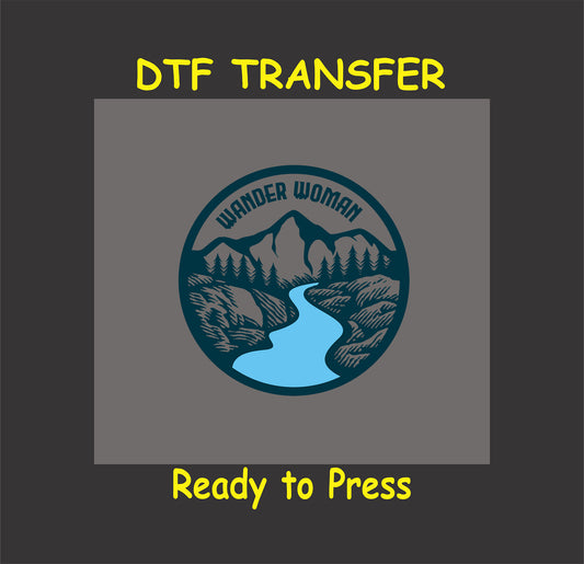 "Wander Woman DTF transfer with mountain, river, and tree design, ready to press for outdoor and hiking-themed apparel."