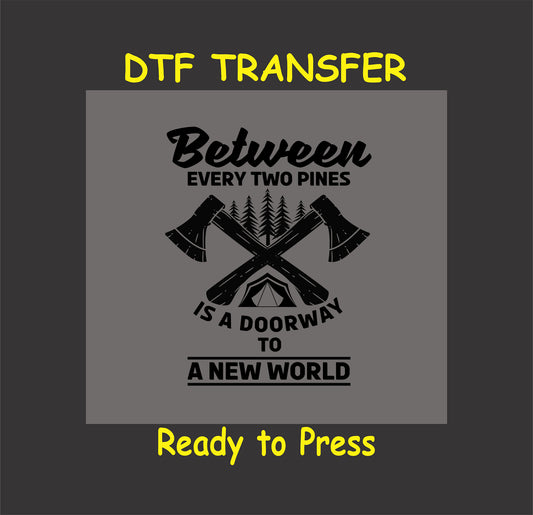 "DTF transfer with crossed axes, trees, and tent, saying 'Between Two Pines is a Doorway to a New World,' for camping apparel."