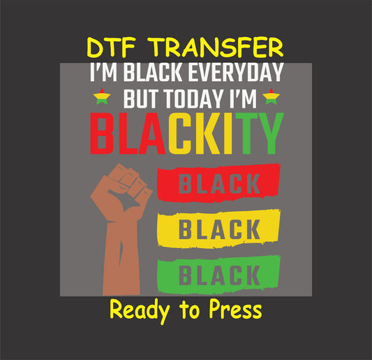 "I'm Blackity Black DTF transfer with red, yellow, green accents and raised fist design, ready to press."