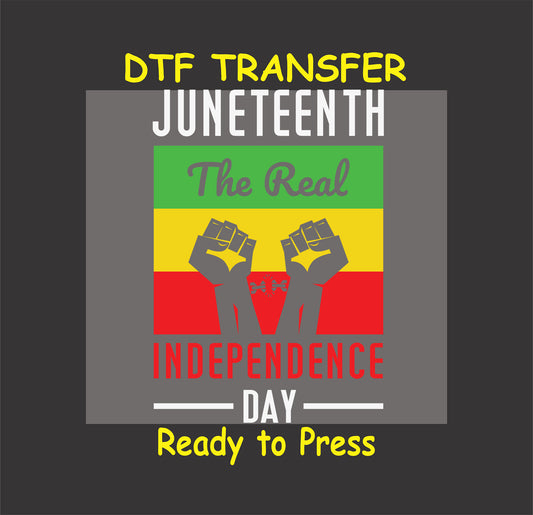 "Juneteenth DTF transfer with raised fists, bold 'The Real Independence Day' text, and vibrant red, yellow, and green colors."