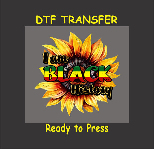 "I Am Black History" DTF transfer featuring a vibrant sunflower design with bold text in red, green, and yellow.