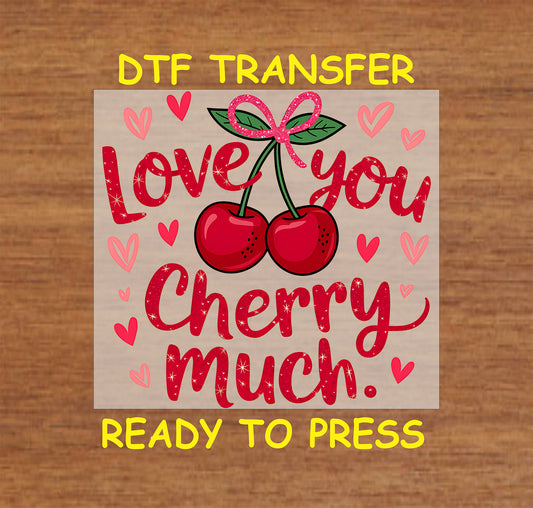 Red glitter cherries tied with a pink glitter bow, surrounded by the text "Love You Cherry Much" with heart accents, DTF transfer ready for pressing.