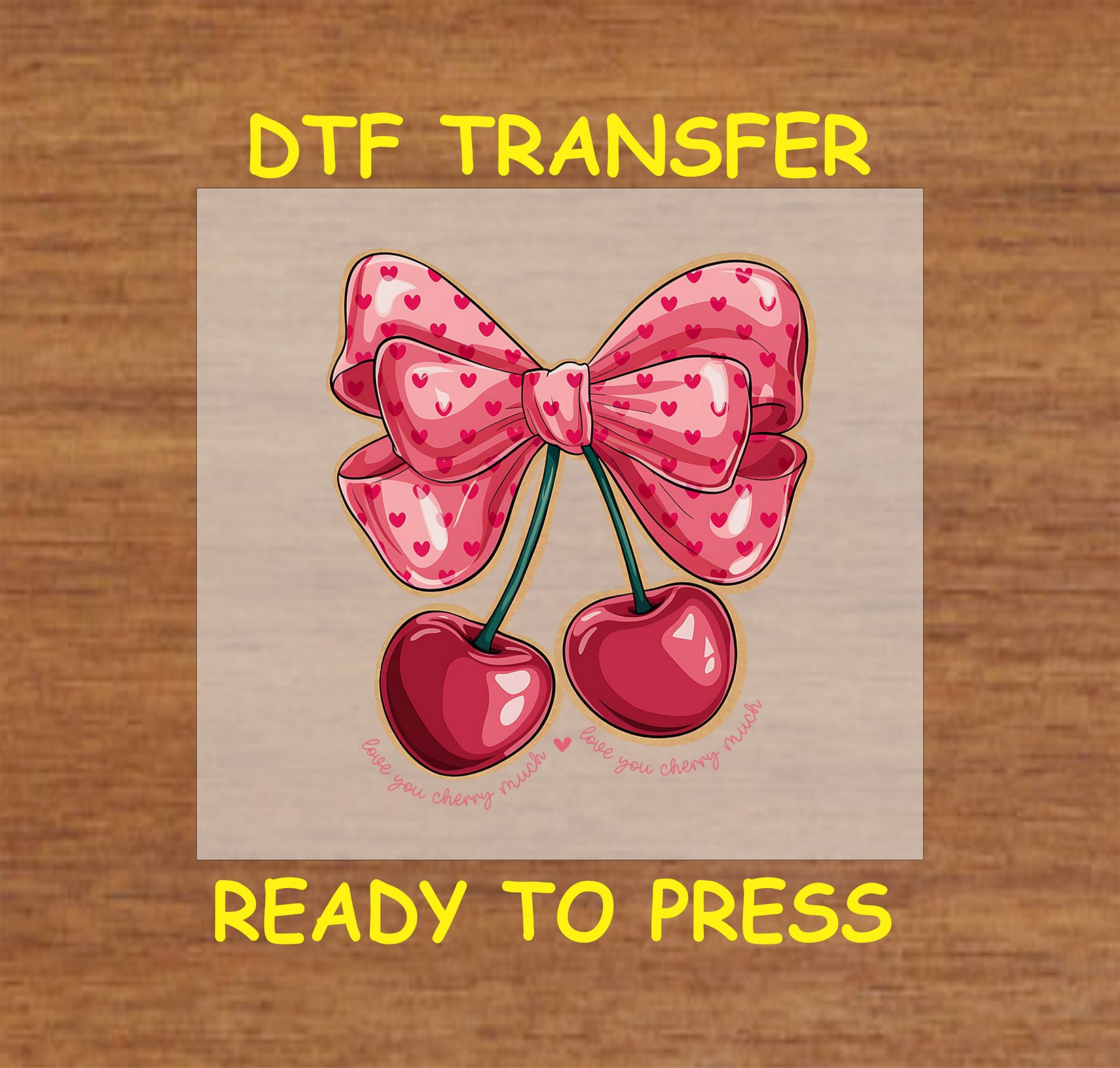 DTF transfer featuring two glossy cherries tied with a pink bow adorned with heart patterns, and the phrase "Love You Cherry Much" below.