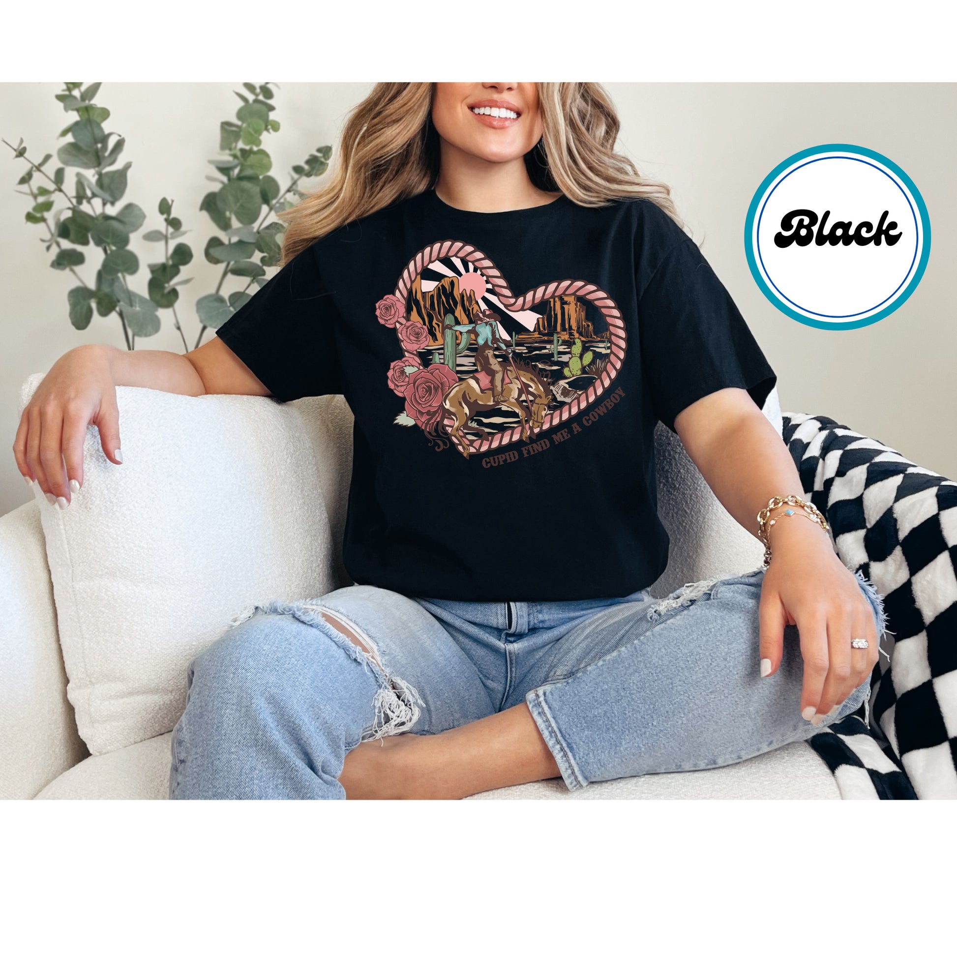 Western Valentine DTF transfer featuring a cowboy on horseback, rope heart, roses, and desert landscape with "Cupid Find Me a Cowboy" text.
