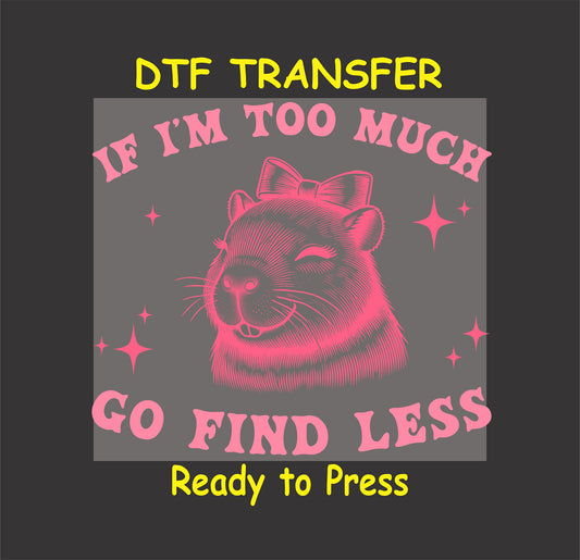 Capybara with a bow smiling, surrounded by sparkles, with "If I'm Too Much, Go Find Less" text in pink.