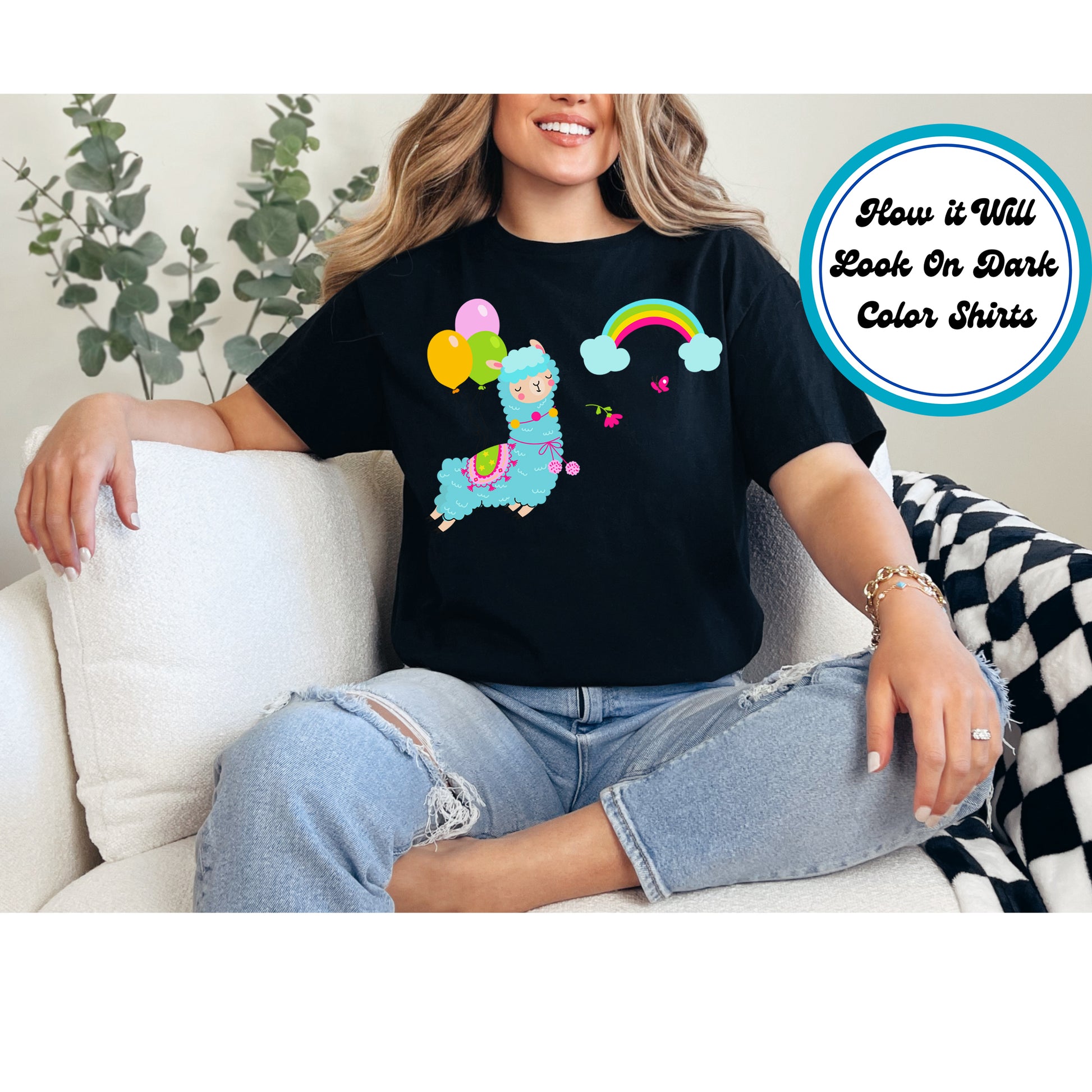 Blue llama floating with balloons, rainbow, and butterfly in a cute and whimsical design.