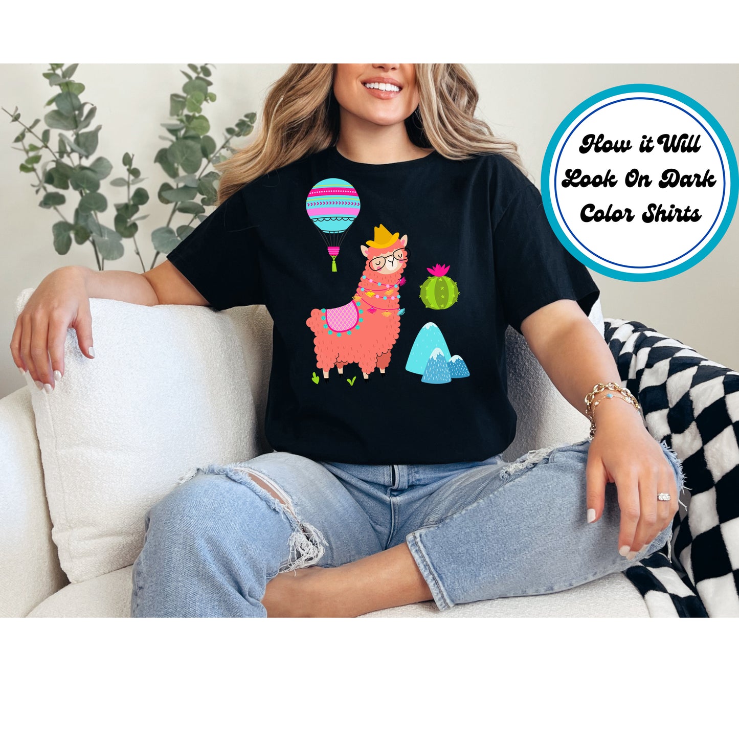 Stylish llama wearing glasses and a hat, with a hot air balloon, mountains, and cactus.