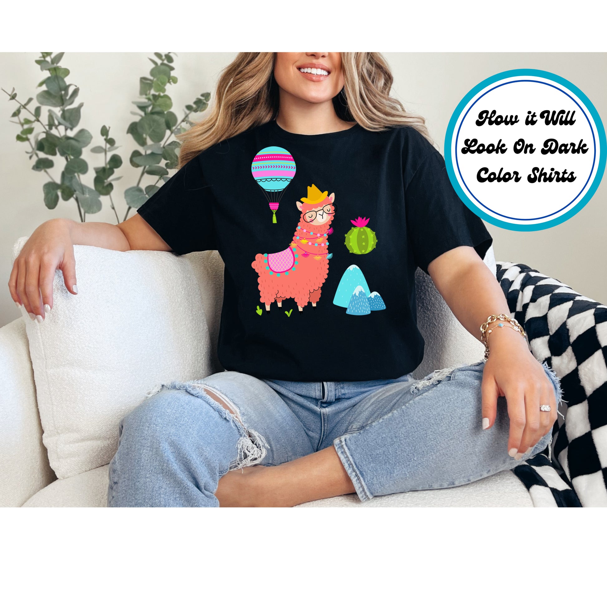 Stylish llama wearing glasses and a hat, with a hot air balloon, mountains, and cactus.