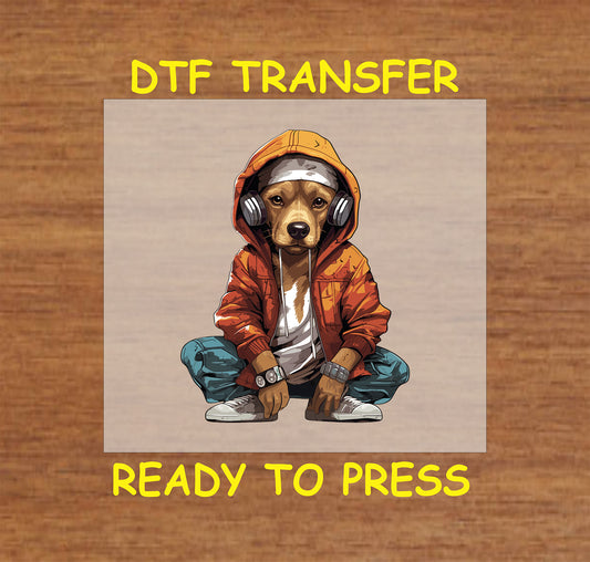 Dog wearing an orange hoodie and headphones in a streetwear pose.