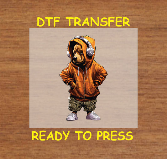 Dog in orange hoodie with headphones in a streetwear pose.