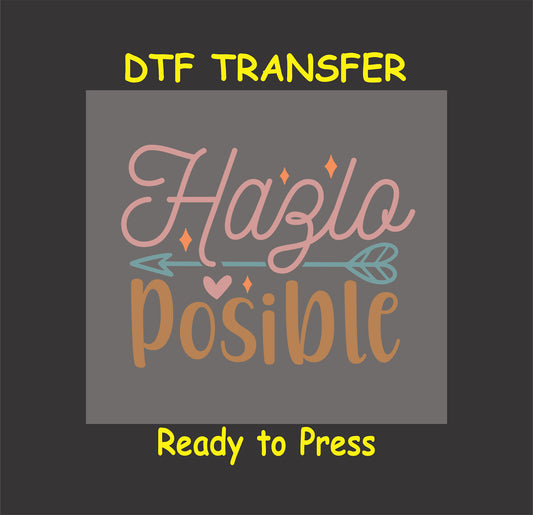 "Hazlo Posible" Spanish phrase with arrow and heart accents, DTF transfer.