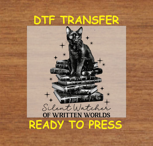 Gothic black cat sitting on books with magical elements in a DTF transfer.

