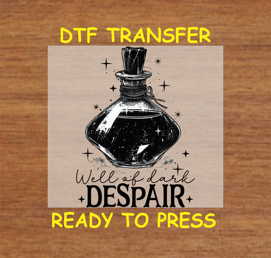 Gothic potion bottle labeled "Well of Dark Despair" with celestial accents in a DTF transfer.