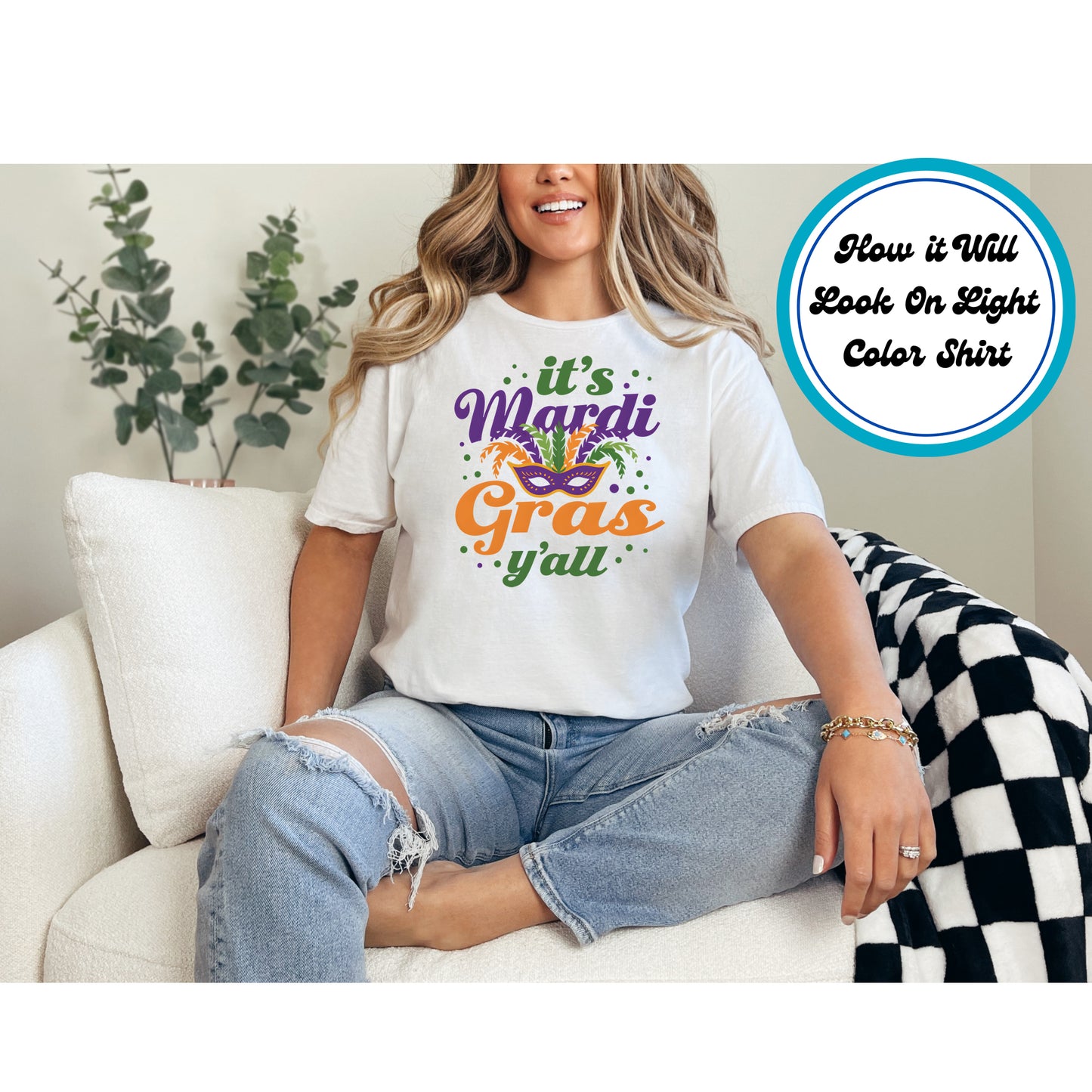 DTF transfer with "It’s Mardi Gras Y’all" text, masquerade mask, feathers, and festive accents.