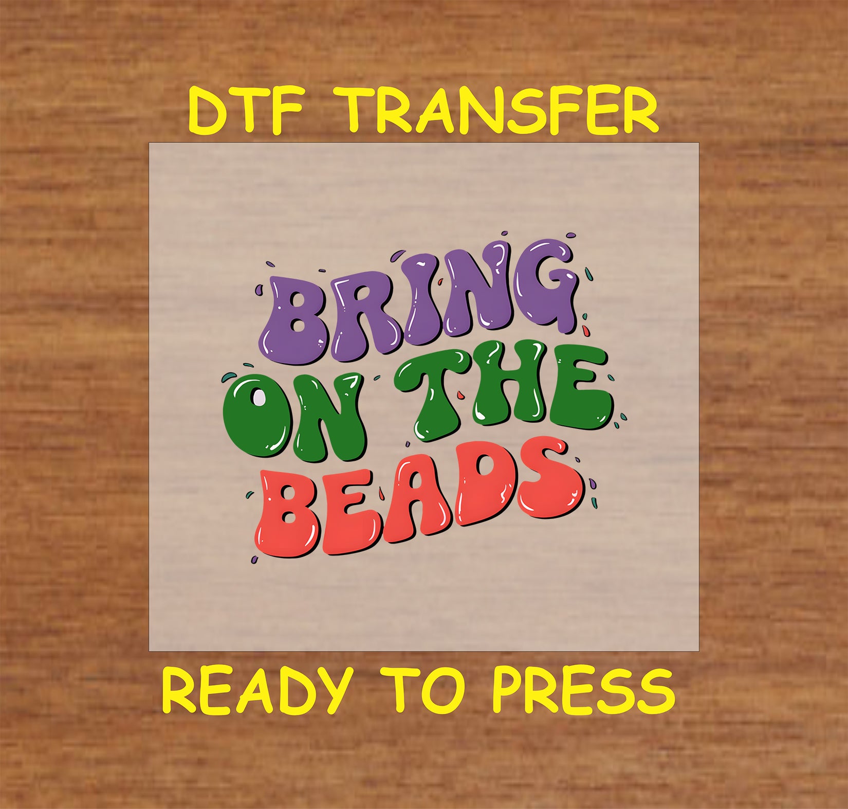 DTF transfer with "Bring on the Beads" text in bold Mardi Gras colors.