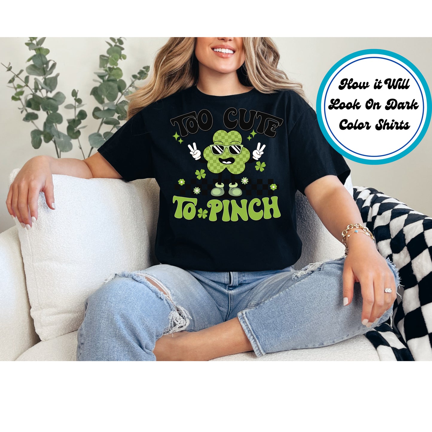 St. Patrick’s Day kids DTF transfer with "Too Cute to Pinch" text, a shamrock character, sunglasses, and checkered background.