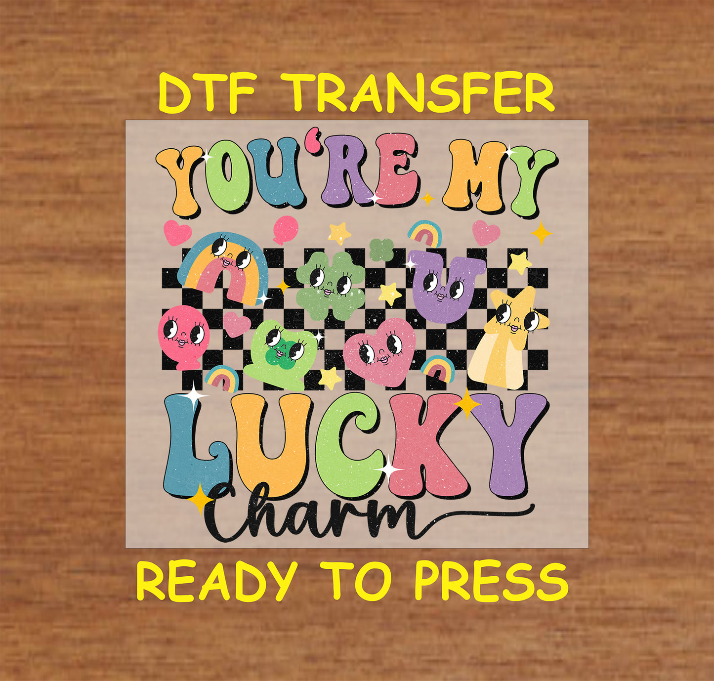 St. Patrick’s Day kids DTF transfer with "You're My Lucky Charm" text, colorful characters, checkered background, and rainbow accents.