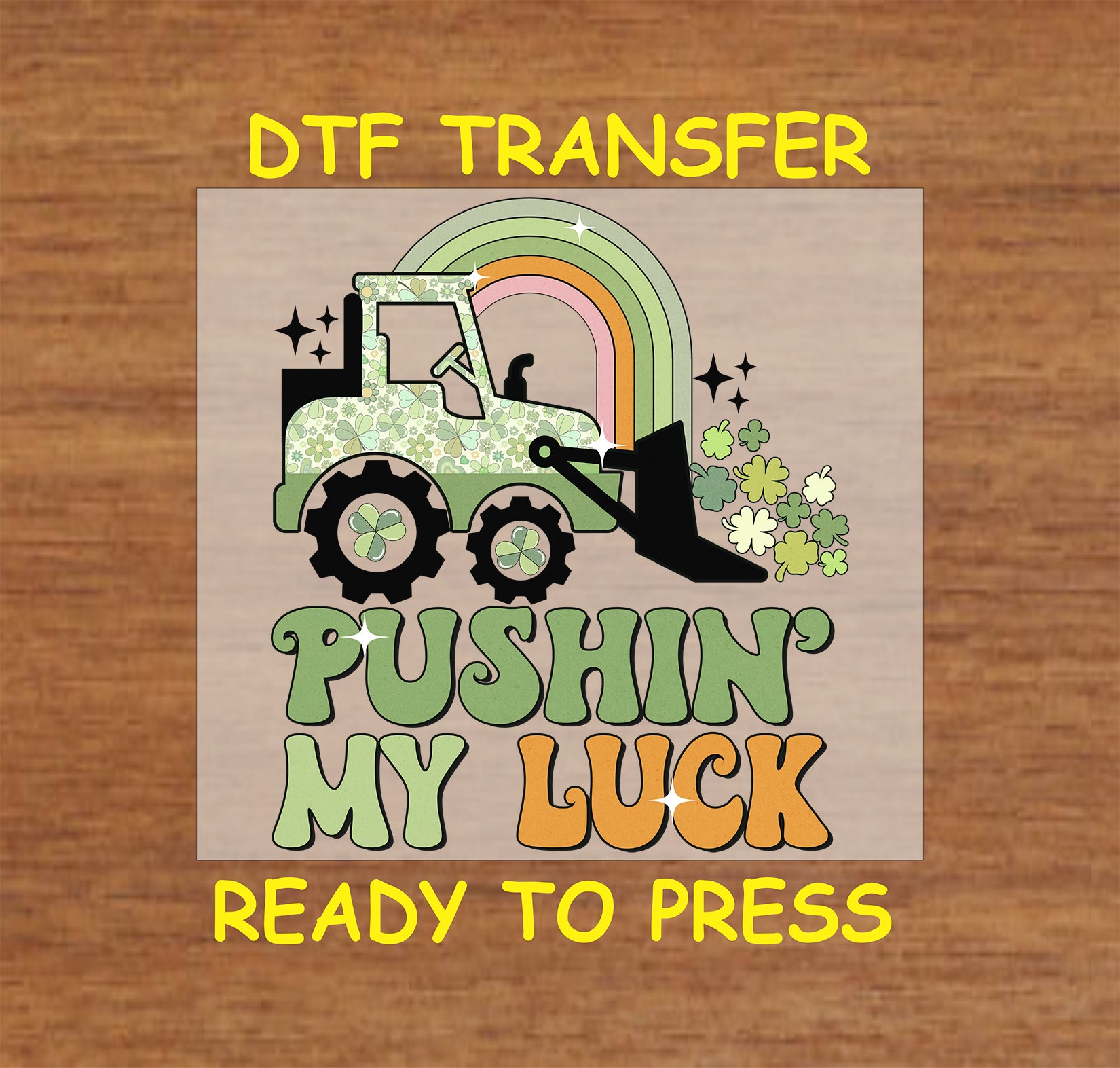 St. Patrick’s Day DTF transfer featuring a construction vehicle pushing shamrocks under a rainbow with “Pushin’ My Luck” text.