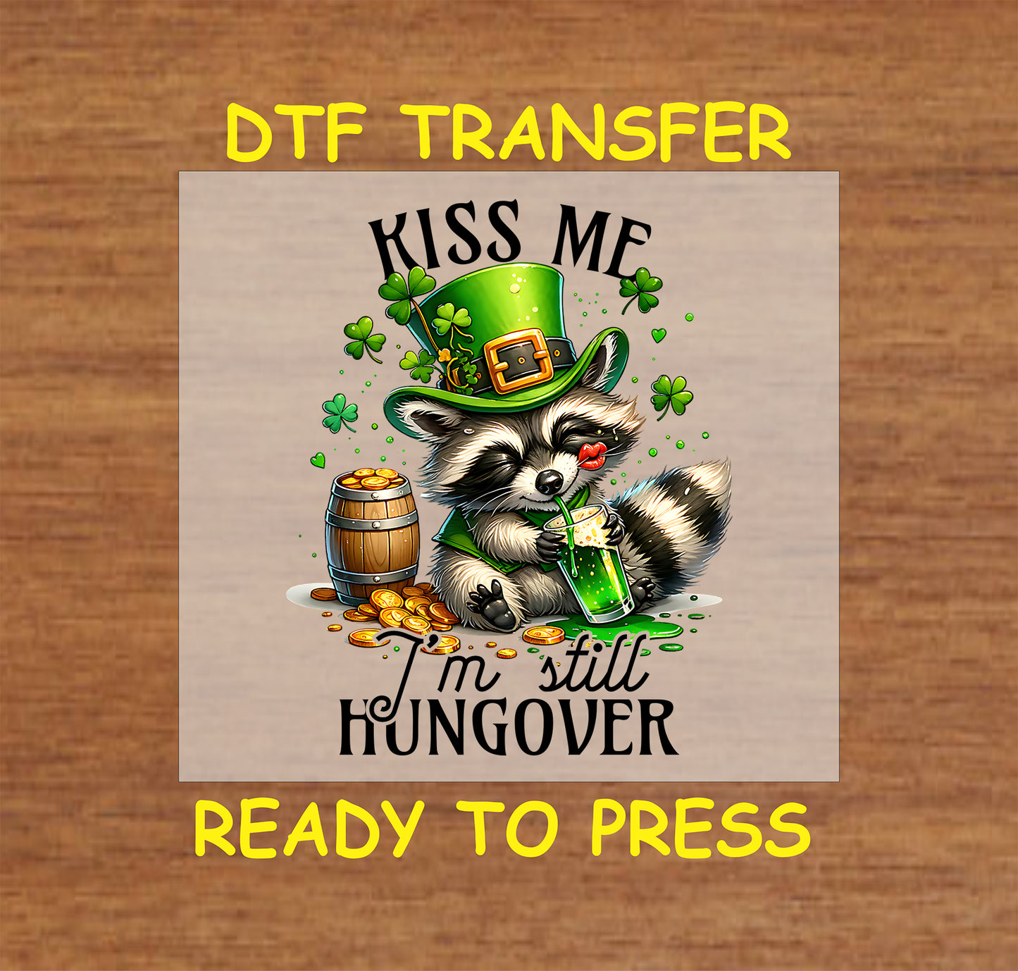 Raccoon in a leprechaun hat sipping a green drink with “Kiss Me I’m Still Hungover” text.