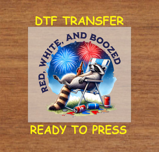Funny raccoon lounging with beer and fireworks, "Red, White, and Boozed" text.