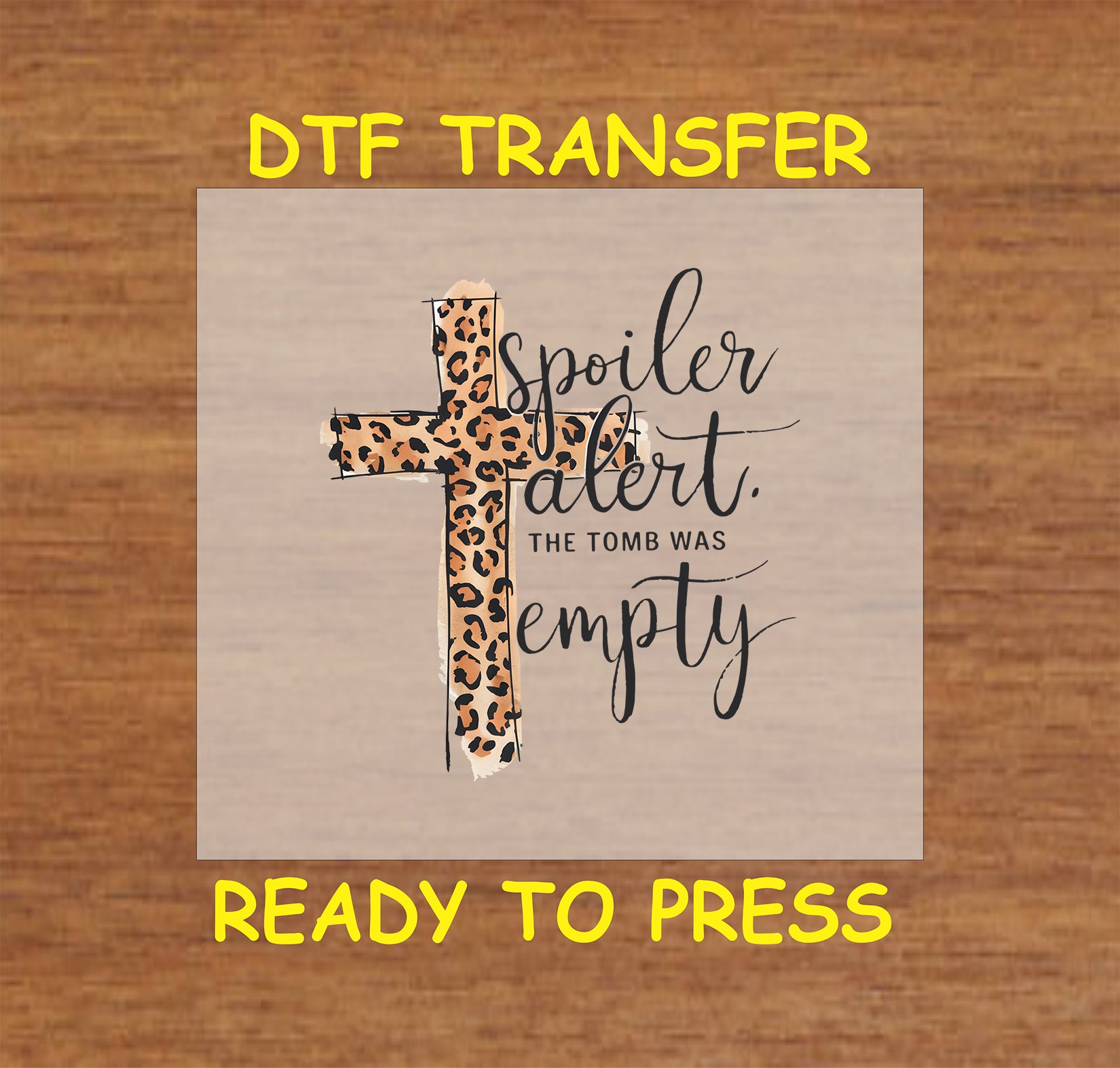 Leopard print cross with "Spoiler Alert: The Tomb Was Empty" text, faith-based Easter DTF transfer.