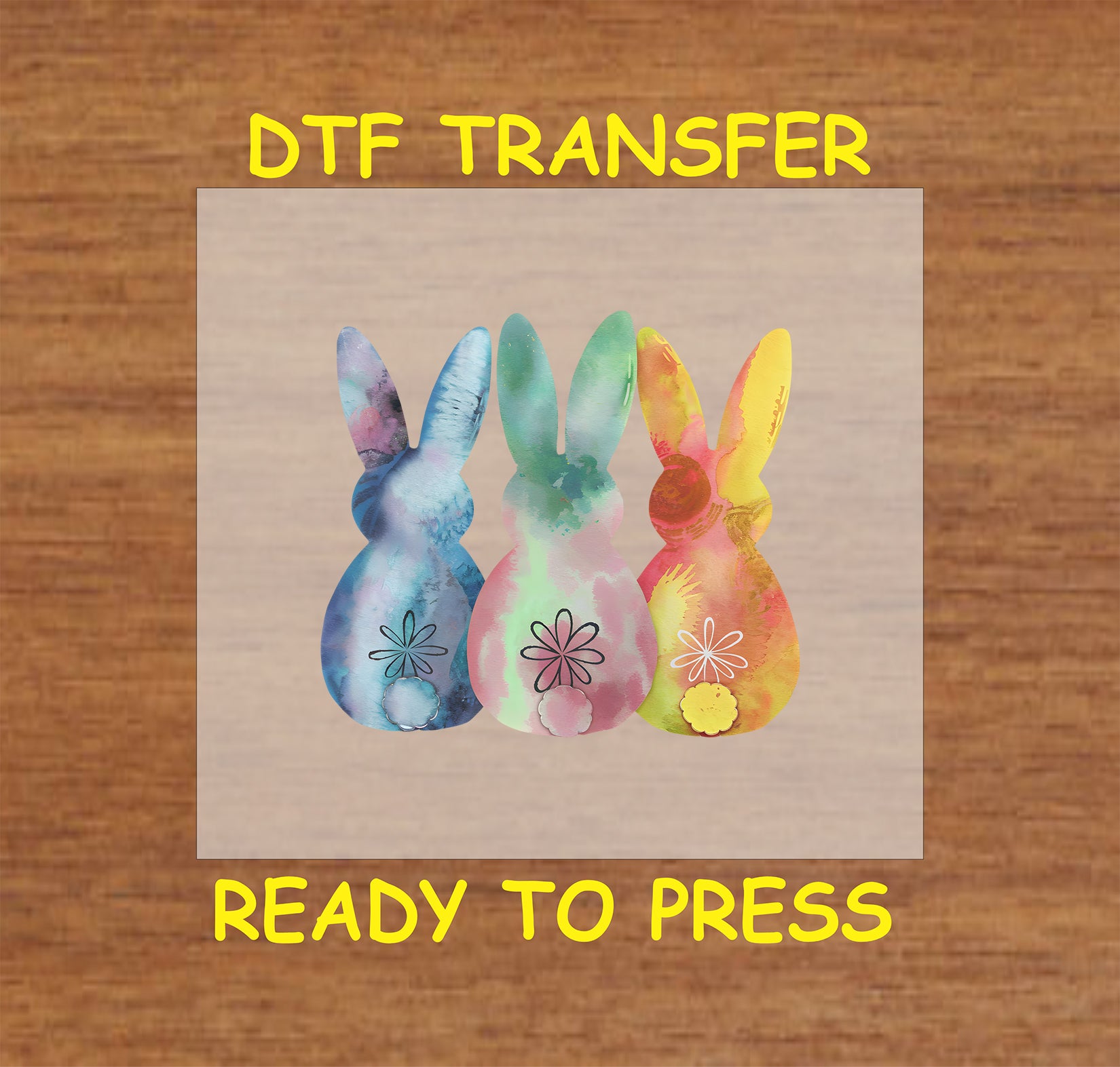 Three watercolor-style bunnies in pastel colors with floral details, Easter DTF transfer.