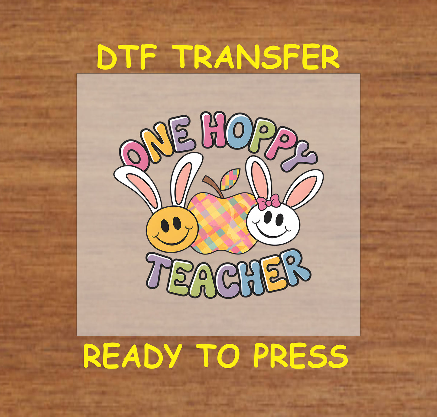 One Hoppy Teacher Easter DTF transfer with bunny-eared smiley faces, plaid apple, and colorful text.