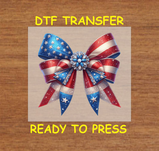 Patriotic stars and stripes bow with blue jewel DTF transfer for 4th of July.
