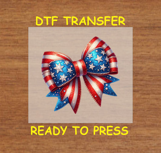 Patriotic star bow DTF transfer featuring red, white, and blue ribbons and stars, perfect for 4th of July.