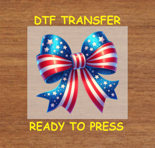 Patriotic bow DTF transfer in red, white, and blue with star details, ideal for Fourth of July designs.