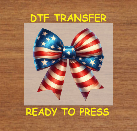 Patriotic bow with red, white, and blue stars and stripes ribbons for Fourth of July DTF transfer.