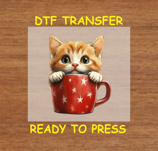 Ginger kitten peeking out of a red mug with white stars DTF transfer for 4th of July.