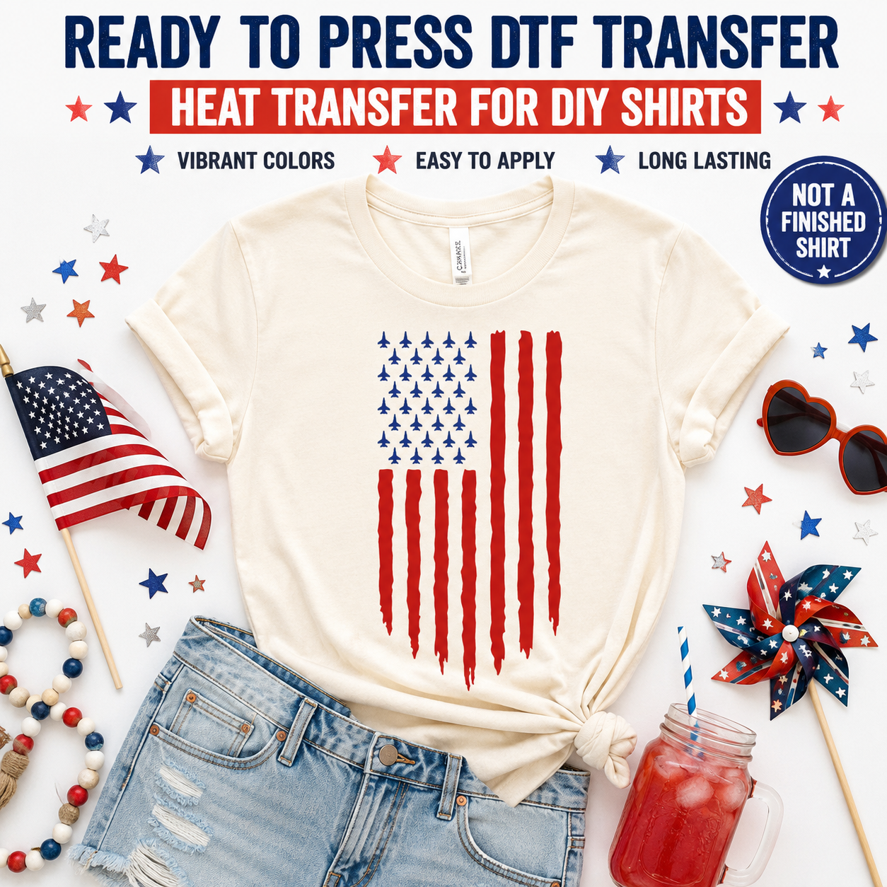 White t-shirt with American flag design, surrounded by patriotic items on a white background.