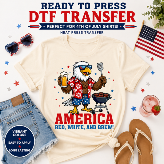 Beige t-shirt with an eagle graphic and text 'America Red, White, and Brew!' on a white background with 4th of July-themed accessories.