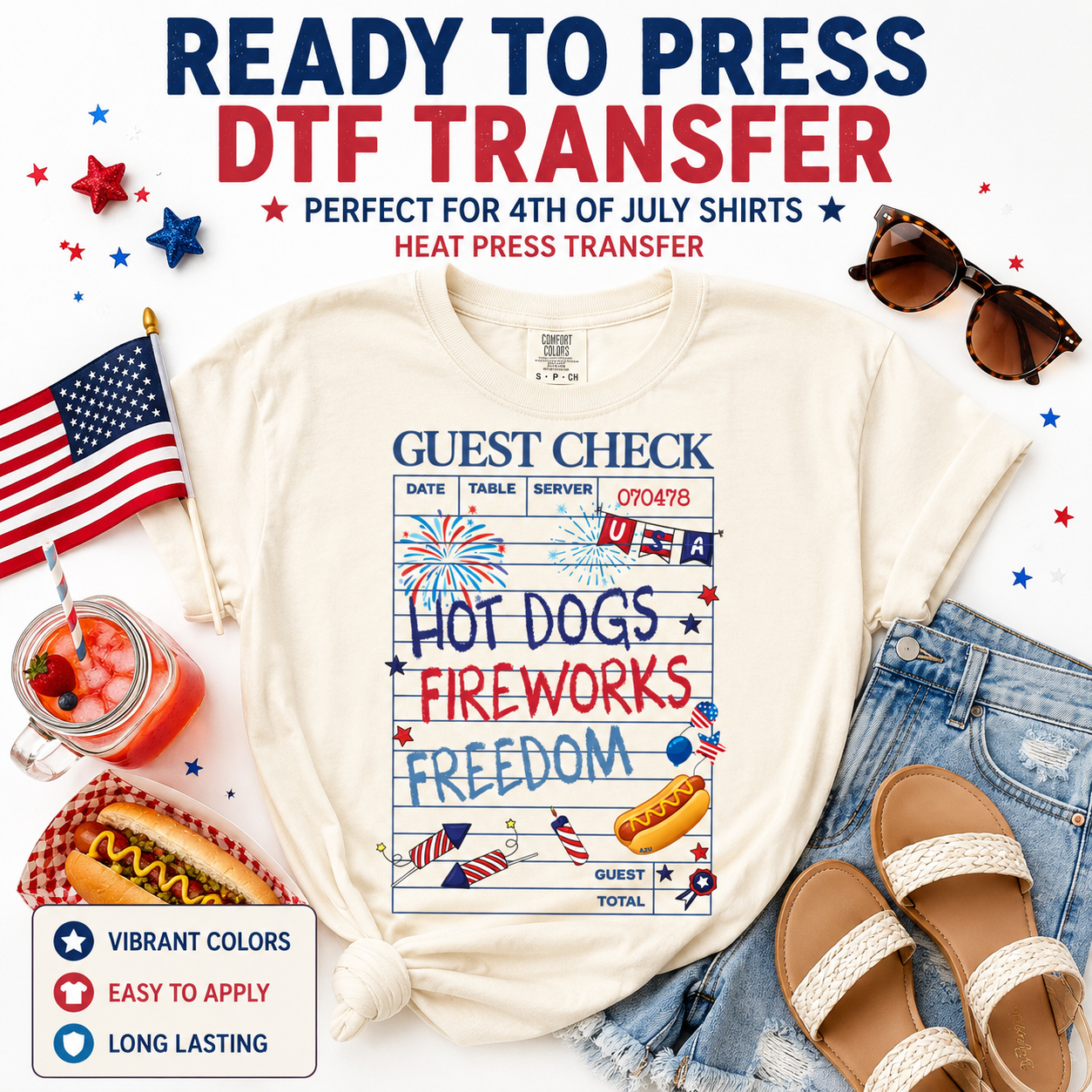 Ready to press DTF transfer mockup featuring a patriotic Guest Check design with Hot Dogs Fireworks Freedom text on a cream shirt, styled with American flag, sunglasses, denim shorts, sandals, drink, hot dog, and 4th of July props.