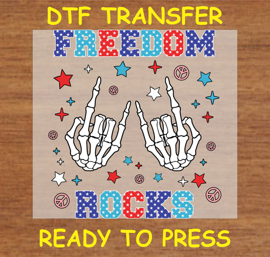 "Freedom Rocks DTF Transfer with patriotic skeleton hands and stars and stripes text design"