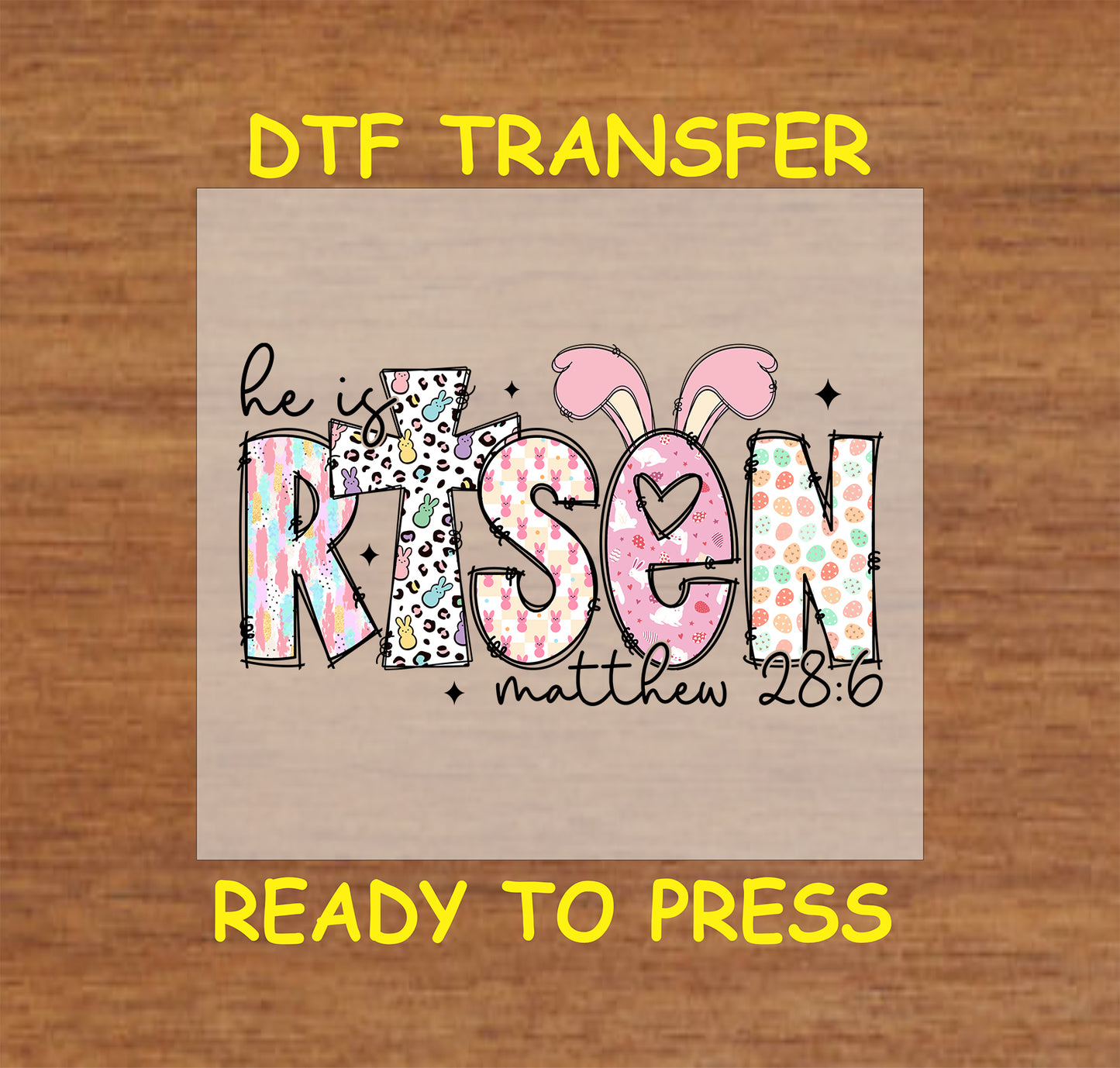 Easter DTF transfer with "He Is Risen" in patterned text, bunny ears, and Matthew 28:6 verse.