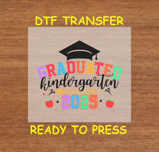 Graduated Kindergarten 2025 DTF transfer with a graduation cap, apples, and colorful text.