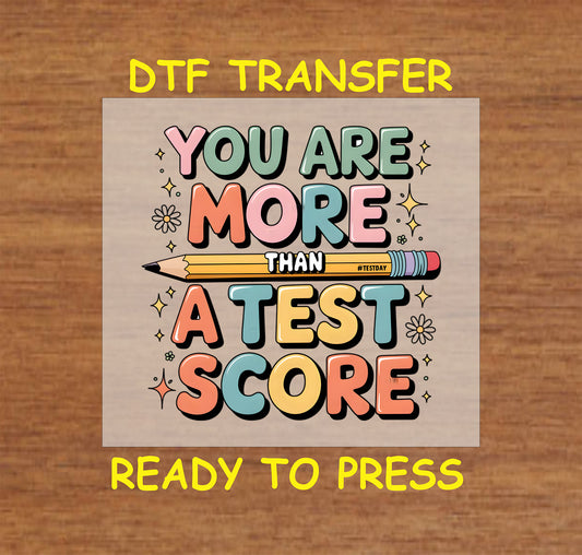 You Are More Than a Test Score DTF transfer with colorful text and a pencil illustration.