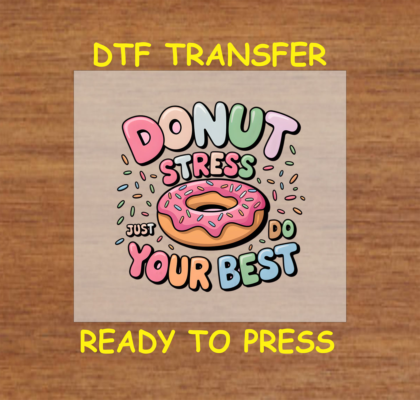 Donut Stress Just Do Your Best DTF transfer with a pink frosted donut and colorful text.