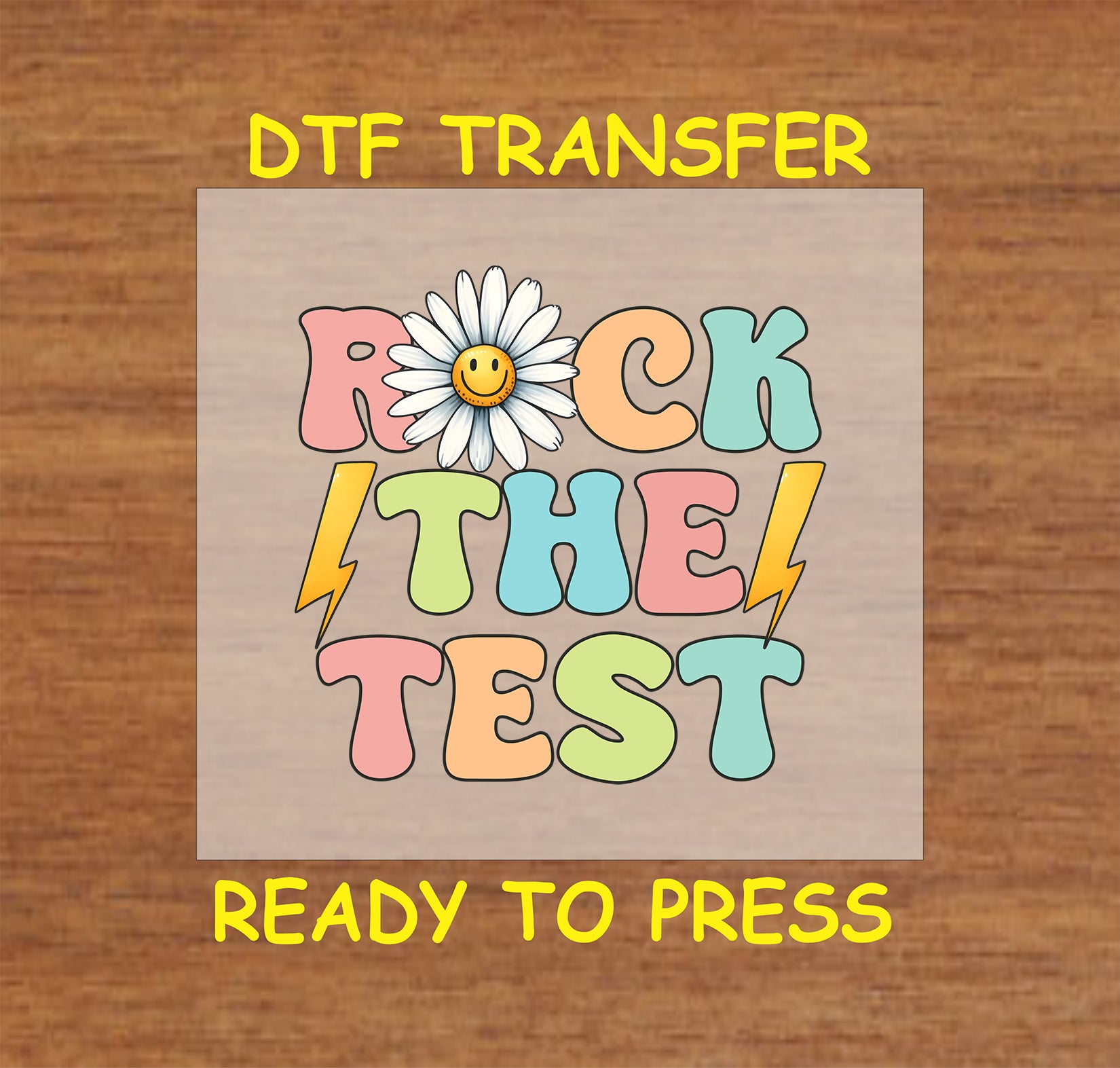 Rock the Test DTF transfer with pastel retro font, smiley daisy, and lightning bolts.
