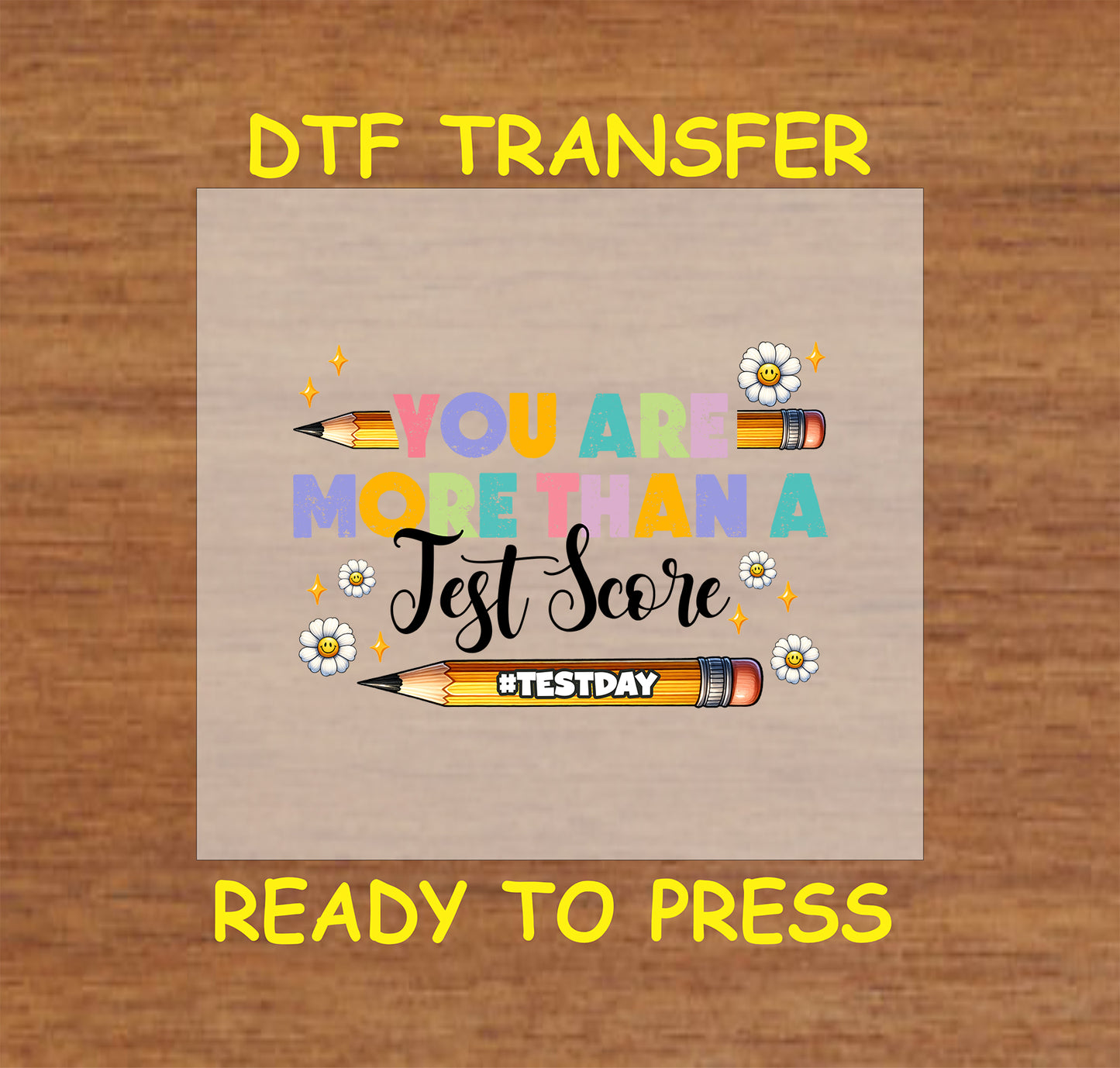More Than a Test Score DTF transfer with colorful text, pencils, and smiley daisies.