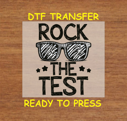 Rock the Test DTF transfer with bold sketched text and sunglasses.