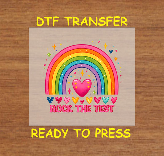 Rock the Test Rainbow DTF transfer with a colorful rainbow, heart accents, and sparkles.