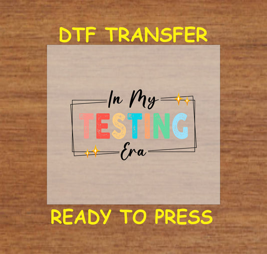 In My Testing Era DTF transfer with colorful distressed text and a stylish boxed frame.