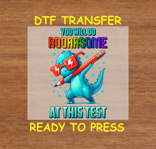 Dinosaur-themed "You Will Do Roar-some at This Test" DTF transfer with bright colors and a fun pencil design.