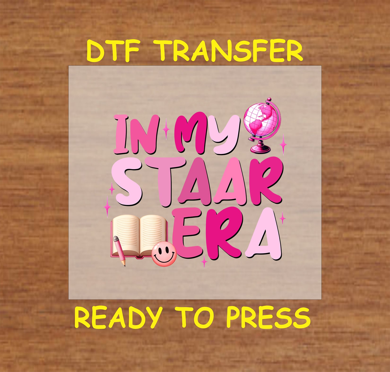 In My STAAR Era DTF transfer with pink text, a globe, book, and smiley face.