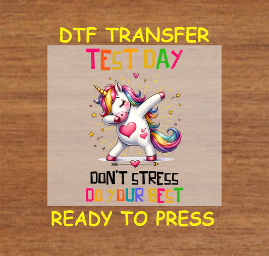 Test Day DTF transfer with a dabbing unicorn, rainbow text, and motivational message.